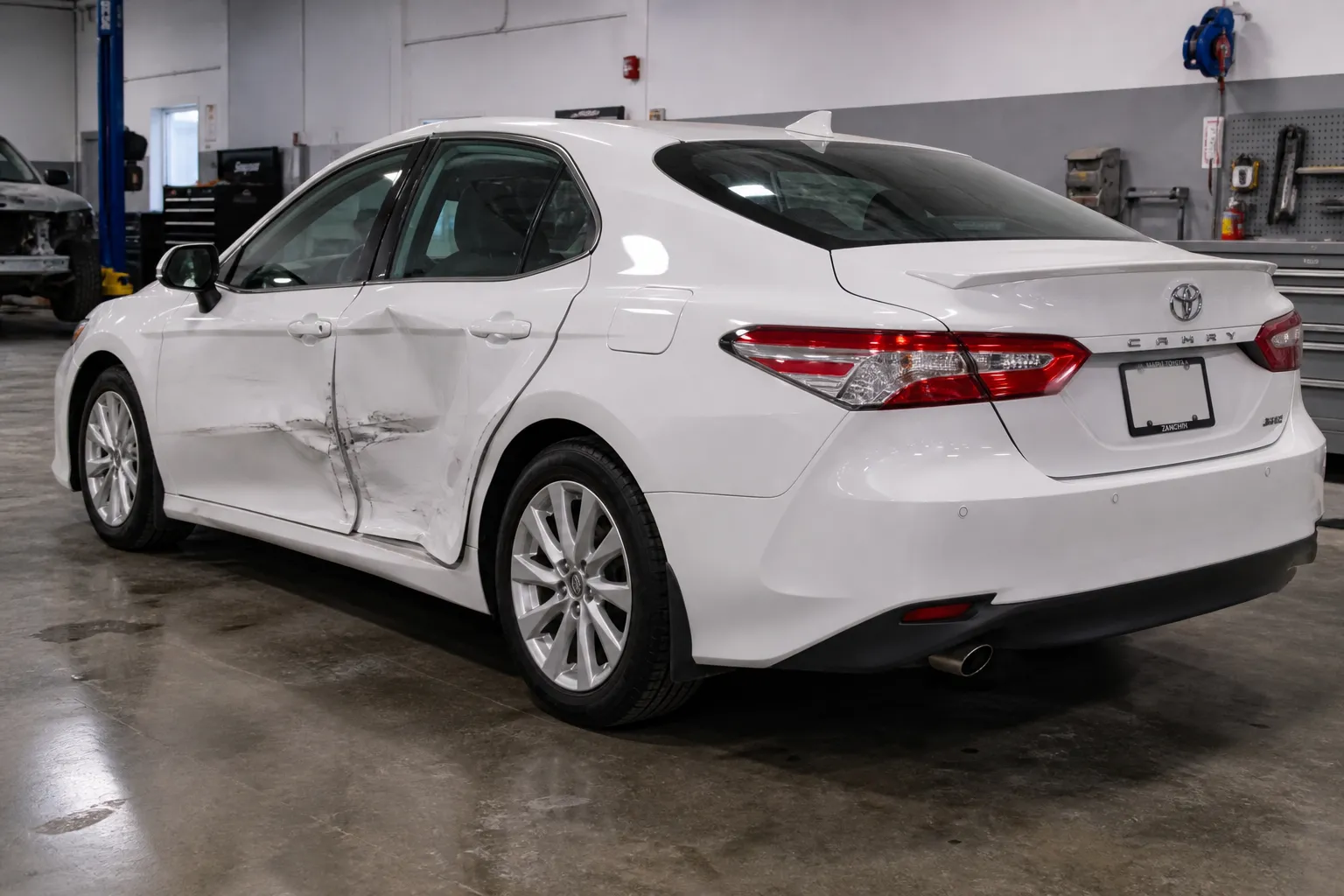 2021 Toyota Camry before repair, showing the collision damage