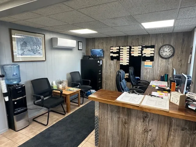 Front office reception and waiting area at Loretto Auto Body